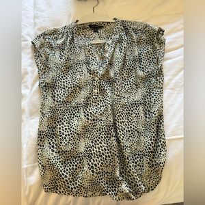 Spotted black and cream top